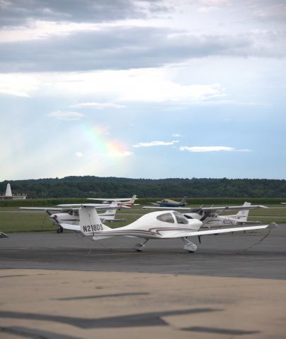 Diamond Star (N218DS) - Rainbow in the distance.