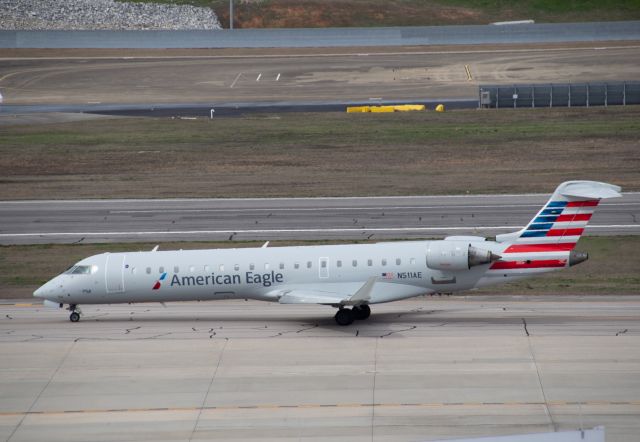 Canadair Regional Jet CRJ-700 (N511AE) - N511AE taxiing out of Birmingham Intl. for its route to Charlotte.