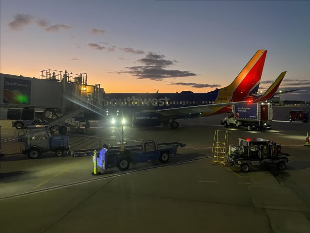 Boeing 737-700 (N570WN) - 10/31/23  getting buttoned up for post sunset departure