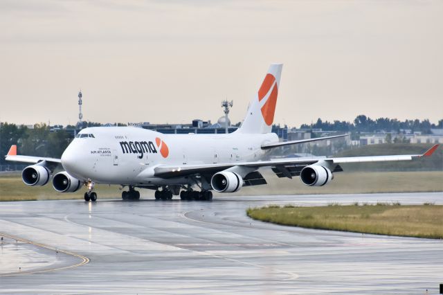 Boeing 747-400 (TF-AMR) - Magma Aviation Boeing 747-45E(BDSF) arriving at YYC on Aug 31. They were bringing in horses for an equestrian event in Calgary next weekend.