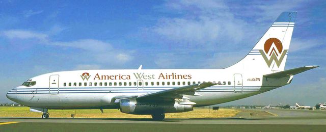 Boeing 737-700 (N135AW) - Image shot prior to extension of 30L and 30R from the former General Aviation building on the South end on the airport 