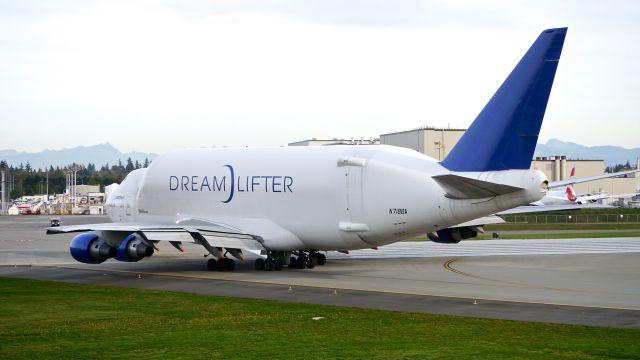 Boeing Dreamlifter (N718BA) - GTI4512 taxis on Kilo 1 for a flight to RJGG/NGO on 10.15.15. (LN:932 / cn 27042).