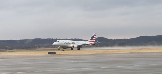 Embraer 170/175 (N763CC) - I've worked at MHK for 6 years, and for 6 years I've been trying to achieve a photo like this with the water spray on takeoff!!!!