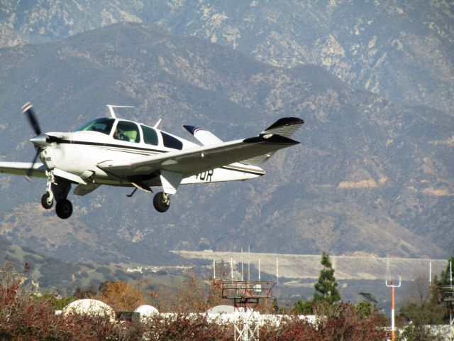 Beechcraft 35 Bonanza (N7740R) - Taking off RWY 26L