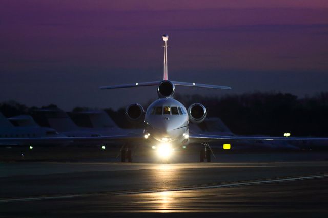 Dassault Falcon 900 (N297GB) - Taxiing to the ramp at PDK airport in Atlanta Georgia. Questions about this photo can be sent to Info@FlewShots.com