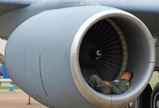 — — - KC-135 Crew member catching a snooze in the engine nacelle. (Submitted by PG, KTCL)