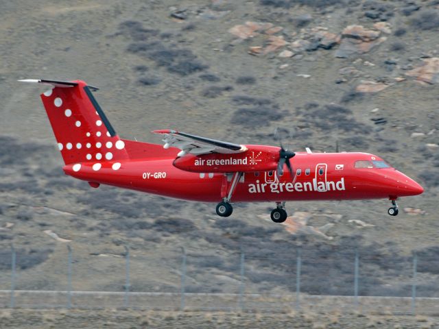 de Havilland Dash 8-200 (OY-GRO) - Just behind the fence