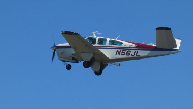 Beechcraft 35 Bonanza (N56JL) - Shortly after departure is this 1977 Beechcraft V35 Bonanza from the Summer of 2020.