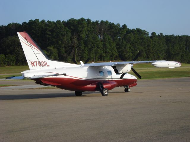 Mitsubishi MU-2 (N7601L) - Fox Stephens Field-Gilmer Municipal Airport (KJXI) Gilmer, TX   Photo taken July 26, 2008  Beautiful piney woods of East Texas!