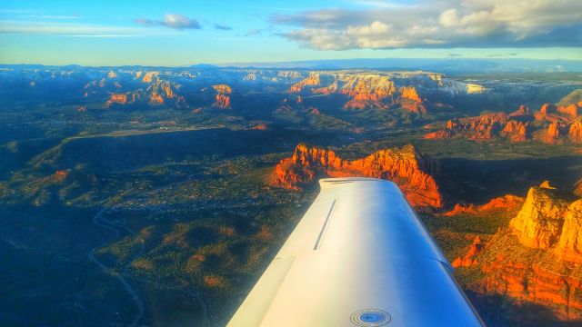 Cirrus SR-22 — - Departing Sedona, Arizona in the early spring with a fresh dusting of snow covering the distant mountains. 