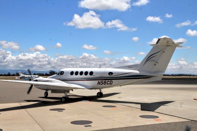 Beechcraft Super King Air 200 (N56CD) - KRDD - 1975 Beech 200 King Air C/N BB-64 pulling away from the Redding FBO - also showing an newer paint scheme than other photos posted on-line.