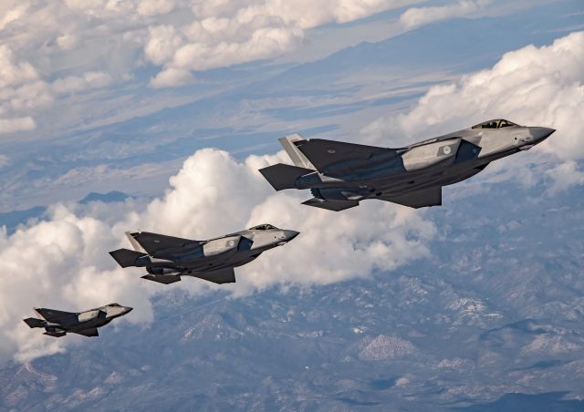 — — - Royal Netherlands Air Force F-35s lining up to get fuel from a an RAF Voyager during a Red Flag exercise.