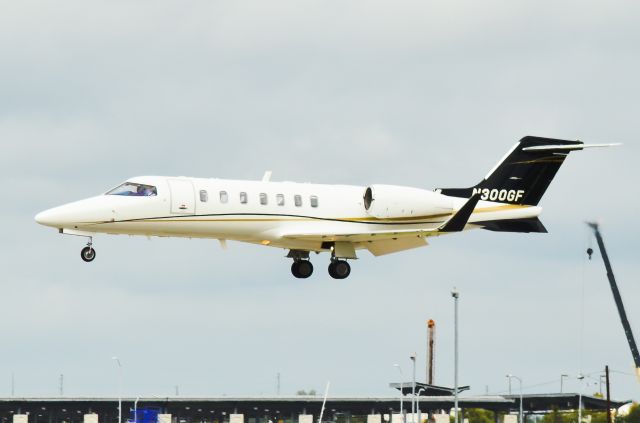 Learjet 40 (N300GF) - Gliding down to 17L in Austin.