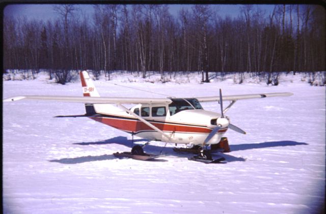 Cessna 206 Stationair (C-FSBV) - CF-SBV, Cessna 206 on wheel skis on the Bloodvein River, 51° 42’ 27”N, 096° 37’ 39”W, about 1971. (About 6 nm southeast of what is now CZTA)