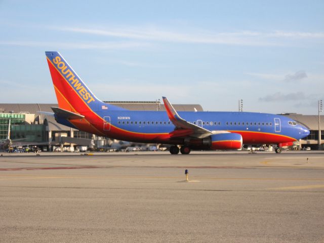 Boeing 737-700 (N218WN) - Holding on RWY 19R