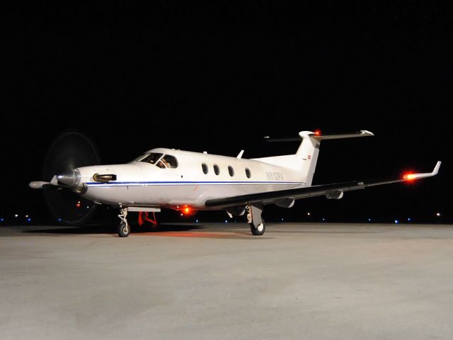 Pilatus PC-12 (N812PA) - Well, if Im going to be up at 2 am, I might as well work on my night shots!  Not a noteworthy paint scheme, but this cargo carrier gets the job done and looks clean doing it.