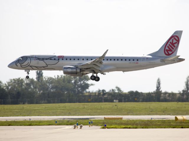 Embraer ERJ-190 (OE-IHE) - Just before touch down runway 11 at Vienna, Austria.br /Airline founded by Formula 1 race car driver Niki Lauda.