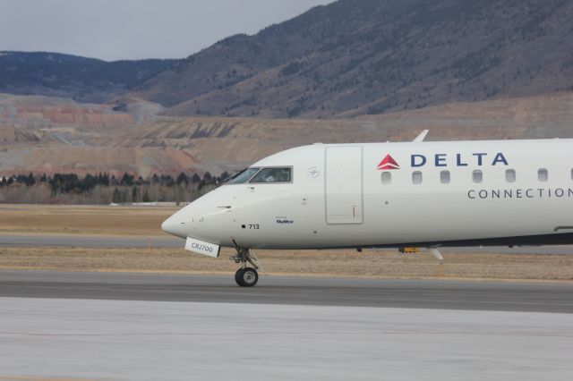 Canadair Regional Jet CRJ-700 (N713EV) - N713EV at Butte as SKYWEST 4312 from KSLC with the Berkeley Pit behind it.br /br /Taken 17:02, November 2, 2024 with a Canon EOS T2i and 70-300mm (300mm, 1/250, ƒ5.0, ISO 125)