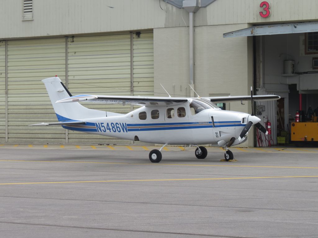 Cessna P210 Pressurized Centurion (N5486W) - Viewed while attending the NIFA SAFECON competition at Don Scott Field KOSU. Aircraft appeared to be receiving routine maintenance.