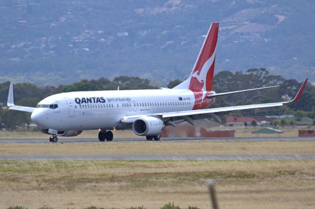 Boeing 737-800 (VH-VXD) - Turning from runway 23 on to taxi-way and heading towards Terminal 1. Friday 1st February 2013.