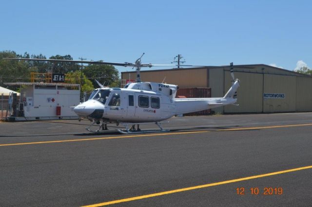 Bell VH-1 (P2-PAP) - Re-fuelling stop, in transit from Papua New Guinea to Australia for dismantling and returning to owner in Canada