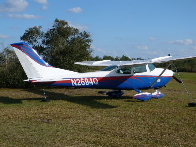 Cessna Skylane (N2694Q) - University of Florida Gator Colors Paint Scheme, White and Blue with Orange Strips and U of F Gator Logos on each side of the nose.