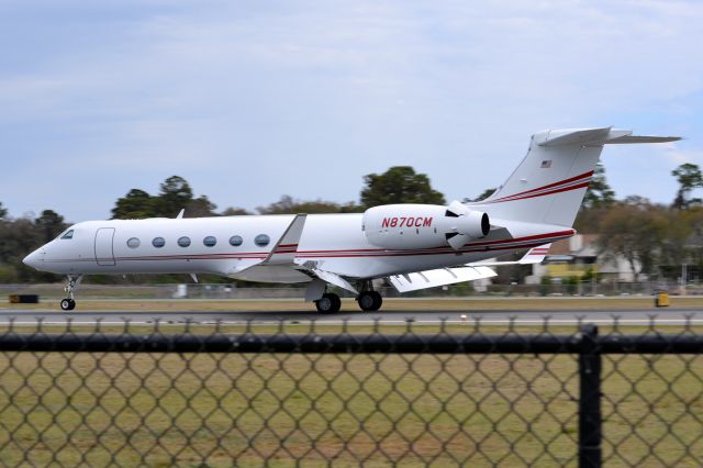 Gulfstream Aerospace Gulfstream V (N870CM) - Sorry for the fence.