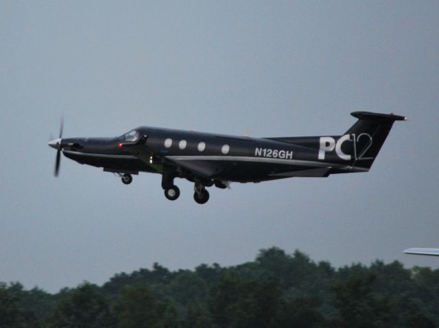Pilatus PC-12 (N126GH) - LABORATORY CORP OF AMERICA HOLDINGS departing runway 2 at KJQF - 7/17/13