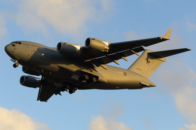 — — - RAAF, C-17 on short finals runway 01.