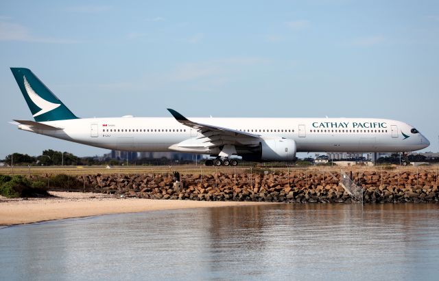 Airbus A350-1000 (B-LXJ) - Taxiing to Rwy 34L.Nice to see two fence photographers!