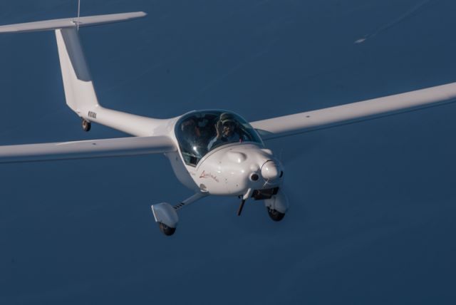 Experimental 100kts (N108UA) - Air-to-air photo taken over Lake Tahoe during the TMGA 2012 West Coast Gathering.