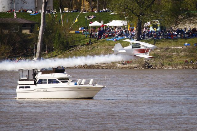 AVIAT Eagle (N34BJ) - Christen Eagle flying over a boat at Thunder Over Louisville