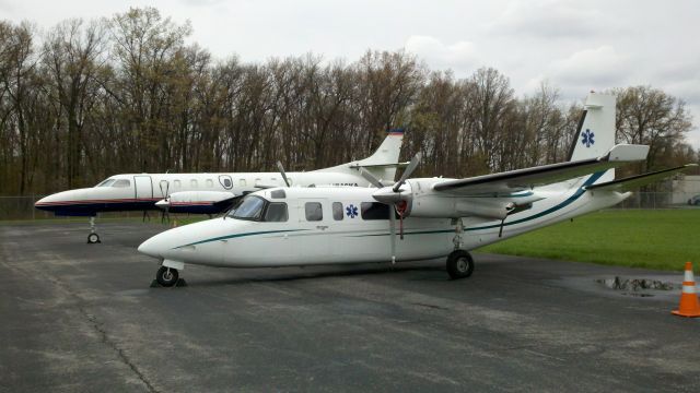 Rockwell Turbo Commander 690 (N57RS) - N57RS and 746KA resting at Grand Aire