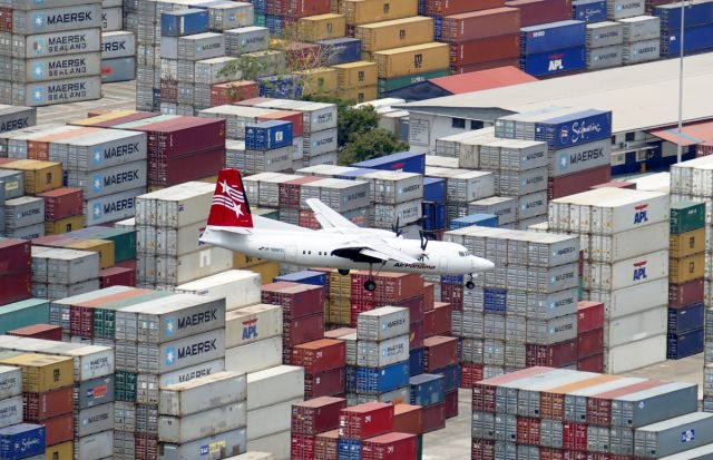 Fokker Maritime Enforcer (HP-1606PST) - Flying over Balboa container port on short final for Rwy 36 of Marcos Gelabert airport (MPMG).