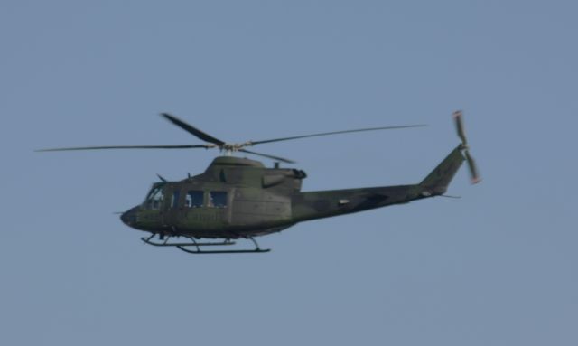 — — - 1 of 3 Canadian Air Force choppers to land at Logan.