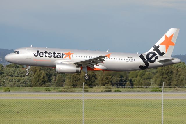 Airbus A320 (VH-VFI) - About to put down on runway 05. Thursday, 19 June 2014.