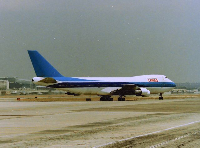 Boeing 747-200 (4X-AXZ) - KLAX - mid 1990s at Imperial terminal - we knew before this El Al cargo touched down that it would never............................... roll out past our photo spot,,,,,,!