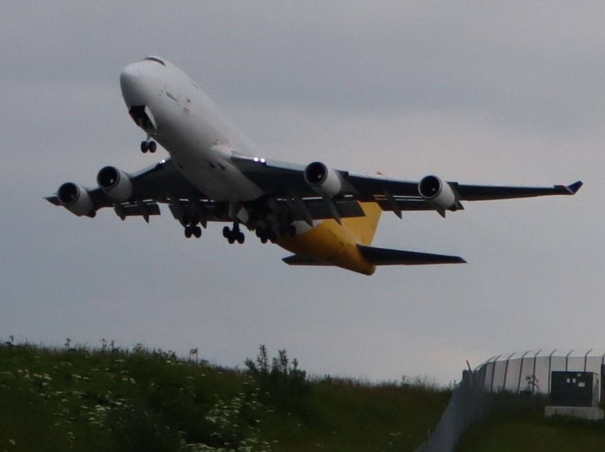 Boeing 747-400 (N415MC) - Takeoff viewed from the north end in 15-33.