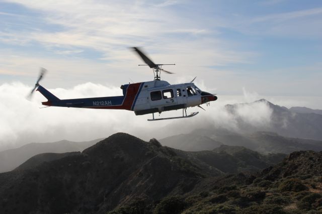 Bell VH-1 (N212AH) - Getting picked up at Diablo Peak on Santa Cruz Island 3/17/14.