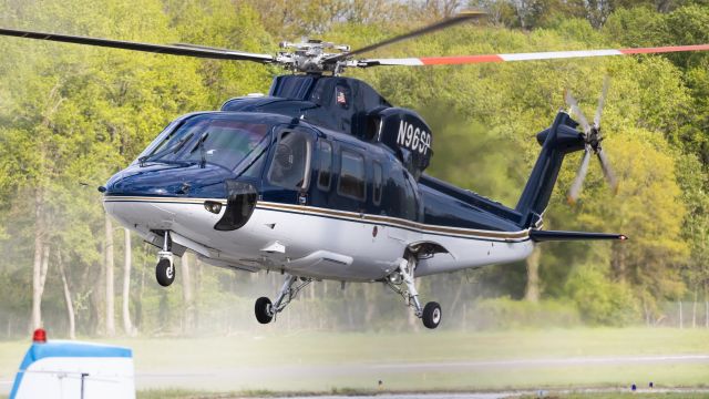 Sikorsky S-76 (N96SP) - N96SP making a dusty touchdown on the taxiway at College Park Airport