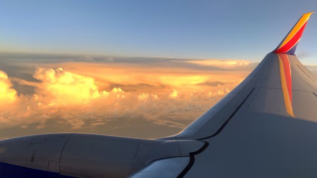 Boeing 737-700 — - Flying from Milwaukee to Denver, Thunderstorms over Iowa.