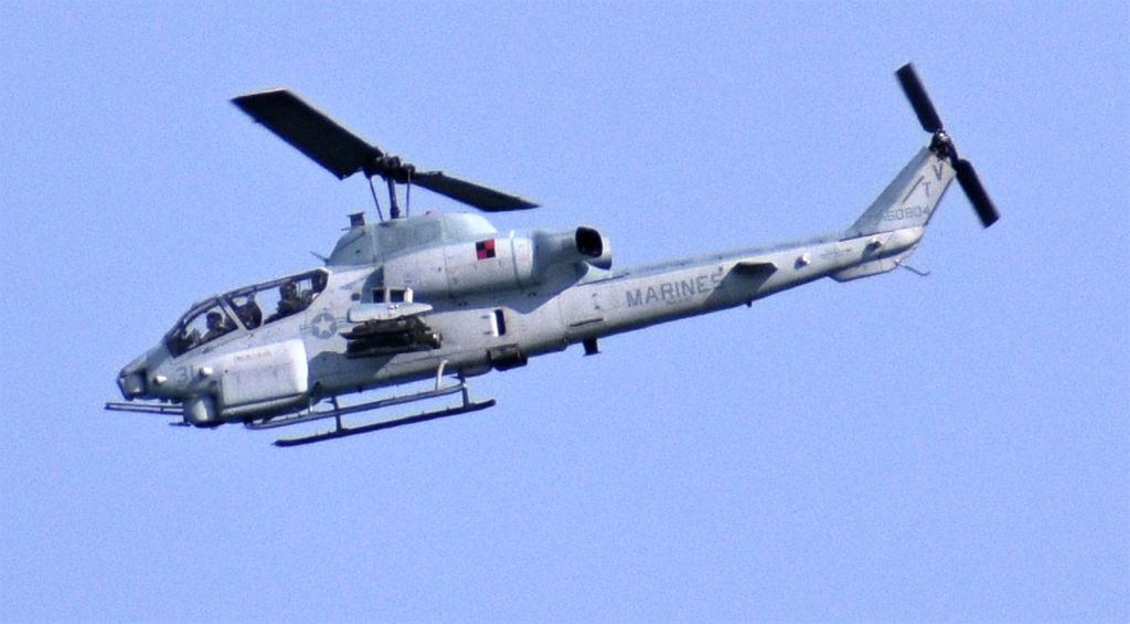 16-0804 — - USMC AH-1W Sea Cobra Tail # 160804 overflying Garden City Beach, SC Pier on 3/30/2019.