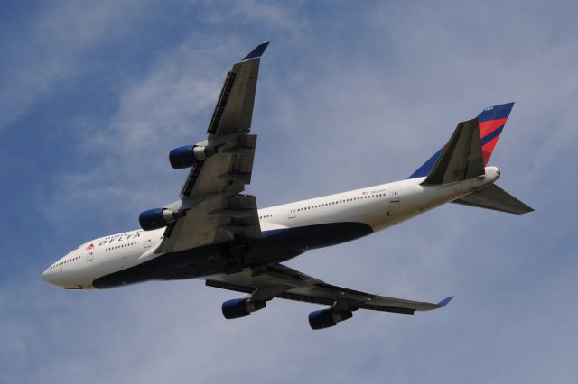 Boeing 747-400 (N664US) - Just found out that this aircraft was severely damaged by hail enroute to ICN on this flight 159 DTW-ICN. Lucky Catch for me. She was fine when she left DTW as you can see! Shot this departing DTW on 06-16-15