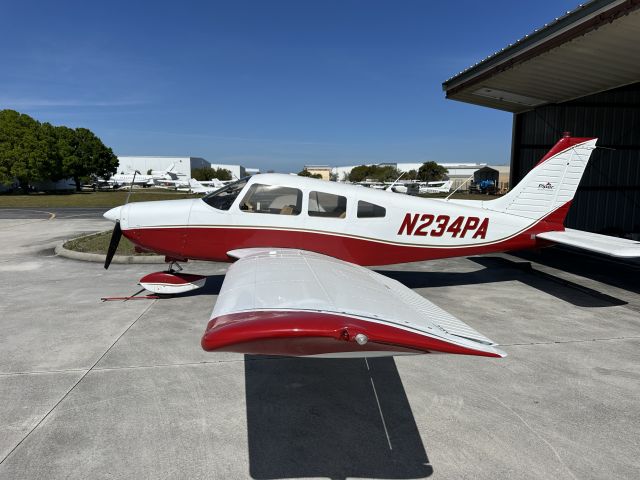 Piper Cherokee (N234PA) - N234PA, looking sharp just outside the hangar Scott Macdonald Aircraft Sales, Inc.