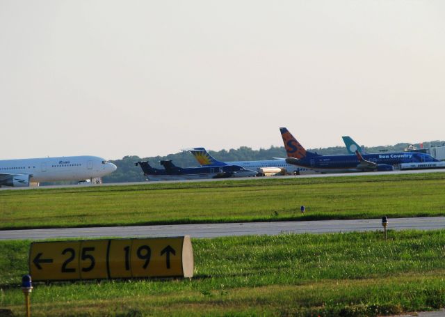 Boeing 737-800 (N806SY) - B737,MD-80, B757, B767 and two B-1900s on the terminal ramp at RFD