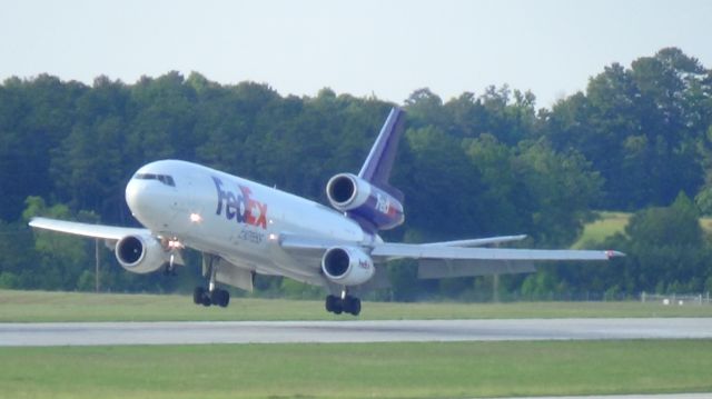 McDonnell Douglas DC-10 (N385FE) - FedEx 765 arriving from Memphis at 6;56 P.M.   Taken June 7, 2015.