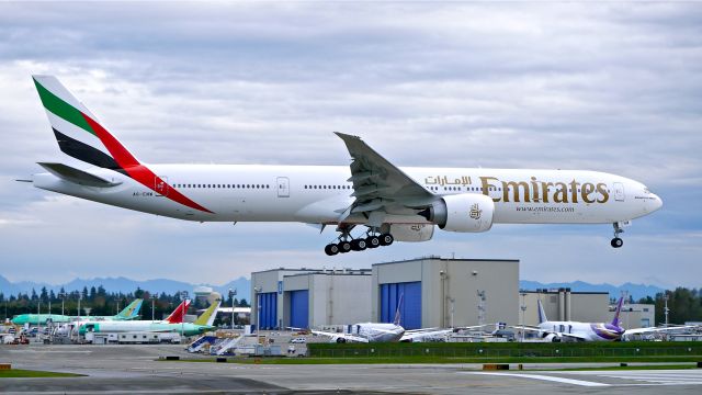 BOEING 777-300 (A6-ENW) - BOE931 from KPDX on final to Rwy 16R on 10/25/14. (ln 1249 / cn 41369). The aircraft was returning after painting.