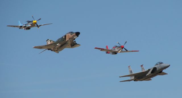 — — - USAF Heritage Flight at the 2006 Reno Air Races. Two P-51 Mustangs, an F-15 Eagle and an F-4 Phantom.