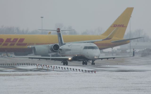 Canadair Regional Jet CRJ-200 (JIA334) - taxiing out for a depature to KCLT at 2:10pm on Sat Dec 4th 2010