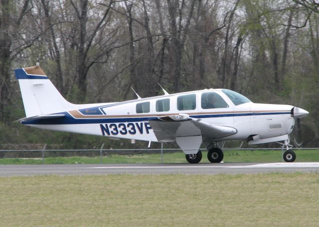 Beechcraft Bonanza (36) (N333VP) - Starting to roll down runway 14 at the Shreveport Downtown airport.